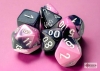 Chessex Mini-Polyhedral 7-Die Set: Gemini (Black Light Reactive) - Black-Pink/White cover image